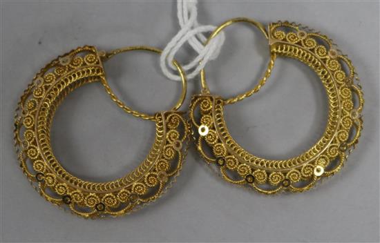 A pair of high carat gold filligree loop earrings, 32mm.